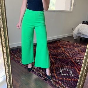 Green flare leg pants